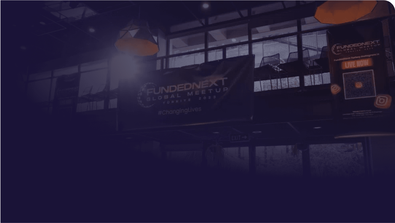 The event space for the FundedNext Global Meetup in Türkiye, 2023, with a large banner on display.